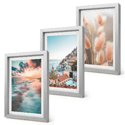Conjunto de quadros com imagens vista para o mar com pôr do sol, casas coloridas e flores