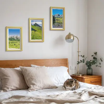 Conjunto de 3 quadros decorativos com estampa de colinas verdejantes, castelo e paisagens montanhosas