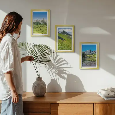 Conjunto de 3 quadros decorativos com estampa de colinas verdejantes, castelo e paisagens montanhosas