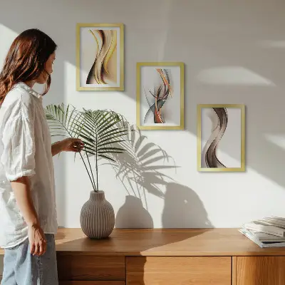 Conjunto de quadros decorativos com estampas de ondas em tons de amarelo cinza e marrom