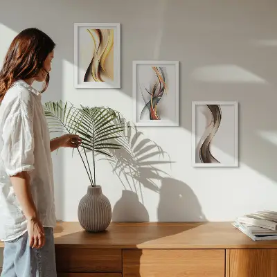 Conjunto de quadros decorativos com estampas de ondas em tons de amarelo cinza e marrom