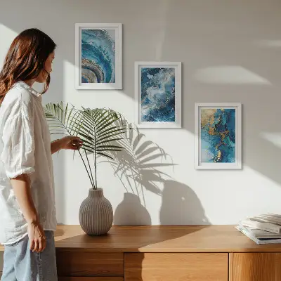Conjunto de 3 quadros decorativos com padrões abstratos azuis