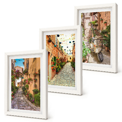 Conjunto de 3 quadros decorativos Ruas encantadoras com flores em um ambiente italiano.
