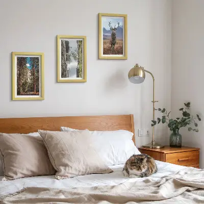 Conjunto de 3 quadros decorativos com estampa de estrada na floresta, montanhas e veados