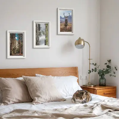 Conjunto de 3 quadros decorativos com estampa de estrada na floresta, montanhas e veados