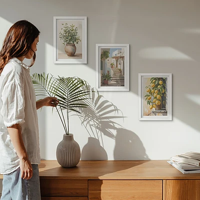 Conjunto de 3 quadros decorativos com estampa de vasos de plantas e limões em rua
