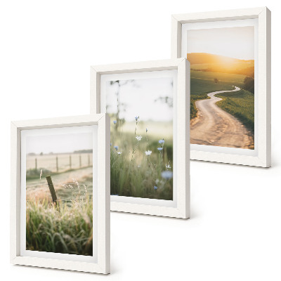 Conjunto de molduras com imagens Paisagem com um prado, estrada e pôr do sol
