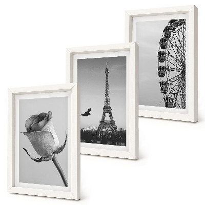 Tríptico com moldura Torre Eiffel e roda-gigante em tons de rosa, em monocromático.