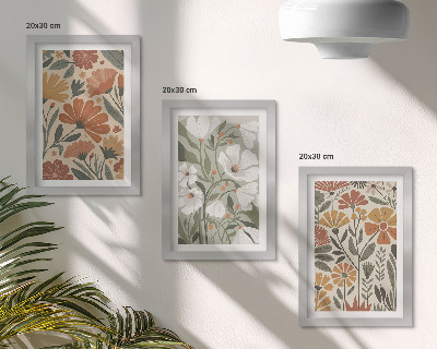 Tríptico com moldura Estampas florais em tons de laranja e verde.