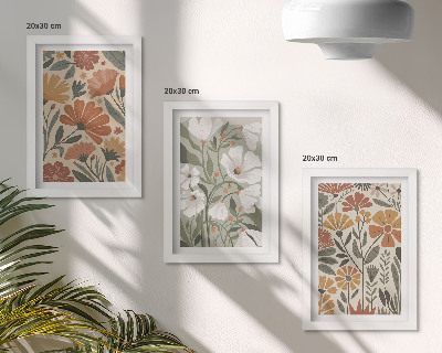 Tríptico com moldura Estampas florais em tons de laranja e verde.