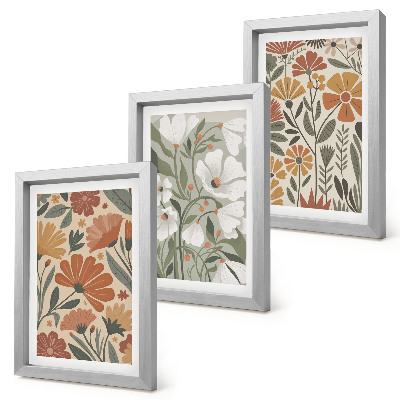 Tríptico com moldura Estampas florais em tons de laranja e verde.