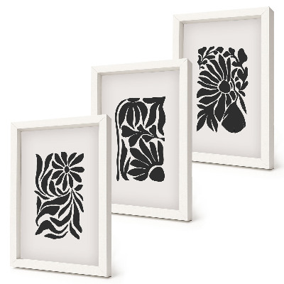 Conjunto de 3 quadros decorativos Padrões abstratos de plantas em tons de preto.