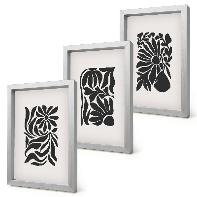 Conjunto de 3 quadros decorativos Padrões abstratos de plantas em tons de preto.