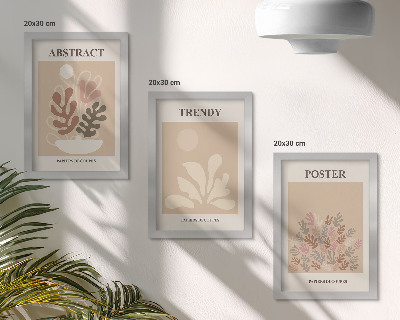 Conjunto de 3 quadros decorativos Pôsteres com motivos de plantas em tons de bege e marrom.