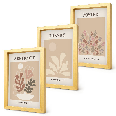 Conjunto de 3 quadros decorativos Pôsteres com motivos de plantas em tons de bege e marrom.