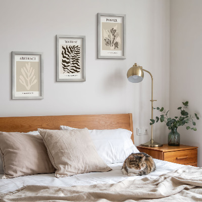 Conjunto de molduras com imagens Padrões de plantas em tons de bege e marrom.