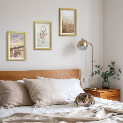 Conjunto de 3 quadros decorativos Vista para o mar com nuvens, apanhador de sonhos e grama.