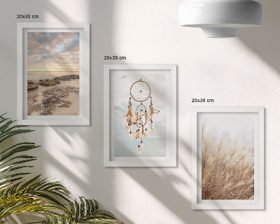 Conjunto de 3 quadros decorativos Vista para o mar com nuvens, apanhador de sonhos e grama.