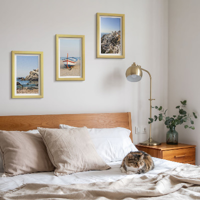 Conjunto de 3 quadros decorativos Vista para o mar com barco e casas brancas na Grécia