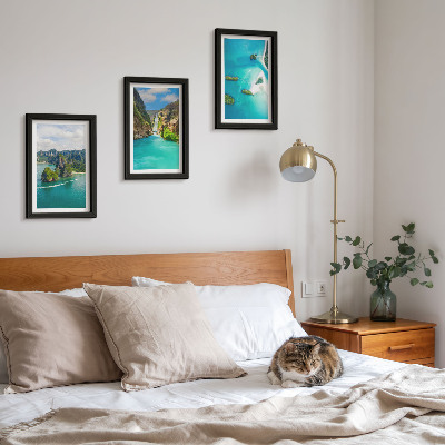 Conjunto de 3 quadros decorativos Paisagens tropicais com ilhas e águas turquesa.