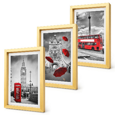 Conjunto de 3 quadros decorativos Vista de Londres com um guarda-chuva vermelho e um ônibus.