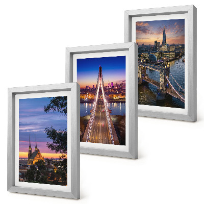 Conjunto de molduras com imagens Vistas da cidade com pontes e pôr do sol.