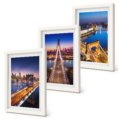 Tríptico com moldura Vistas noturnas de cidades com pontes e rios.