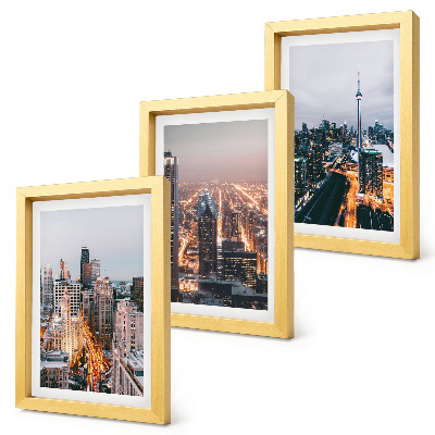 Conjunto de 3 quadros decorativos Vista noturna da cidade com arranha-céus e luzes.