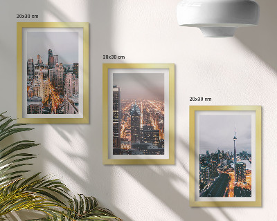 Conjunto de 3 quadros decorativos Vista noturna da cidade com arranha-céus e luzes.