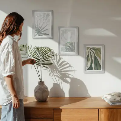 Conjunto de molduras com imagens com folhas de plantas em tons de verde e cinza