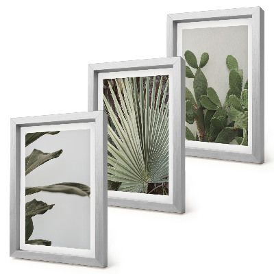Tríptico com moldura Folhas de plantas tropicais em tons pastel.