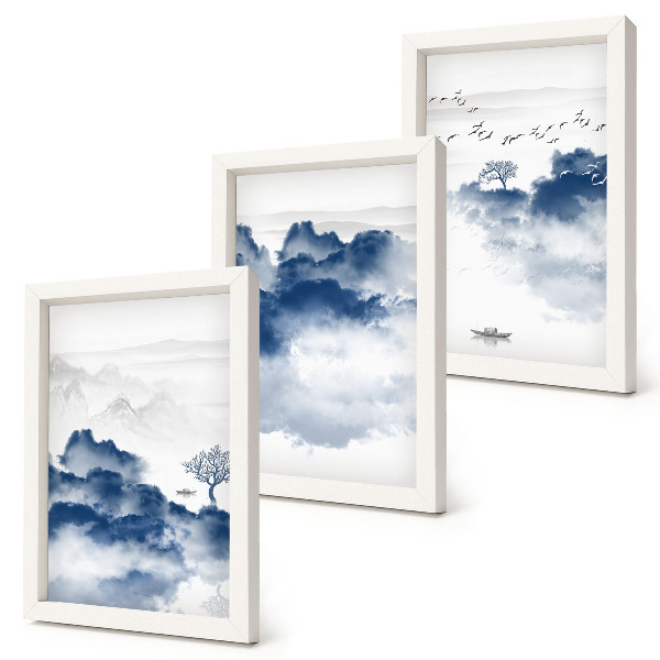 Conjunto de 3 quadros decorativos Montanhas em forma de nuvens com árvores e pássaros ao fundo.