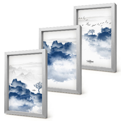 Conjunto de 3 quadros decorativos Montanhas em forma de nuvens com árvores e pássaros ao fundo.