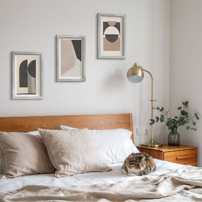 Conjunto de molduras com imagens Formas abstratas em tons de bege e marrom.