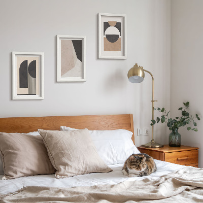 Conjunto de molduras com imagens Formas abstratas em tons de bege e marrom.