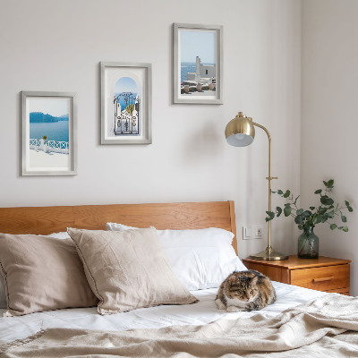 Conjunto de 3 quadros decorativos Vista para o mar com edifícios brancos na Grécia
