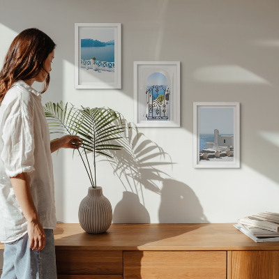 Conjunto de 3 quadros decorativos Vista para o mar com edifícios brancos na Grécia