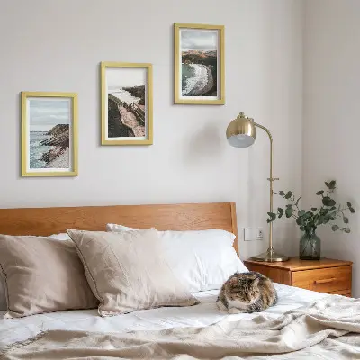 Conjunto de 3 quadros decorativos com vistas para o mar, falésias e paisagens de praia