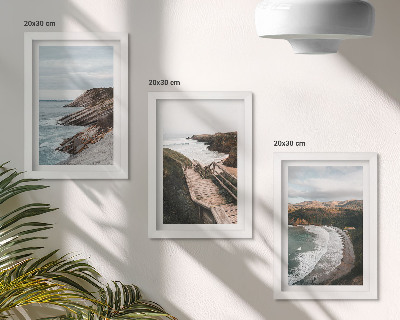 Conjunto de 3 quadros decorativos Vistas para o mar com falésias e paisagens de praia.