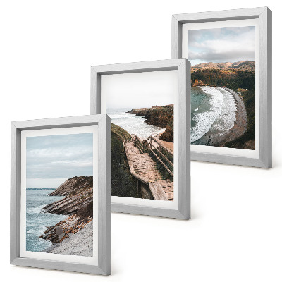 Conjunto de 3 quadros decorativos Vistas para o mar com falésias e paisagens de praia.