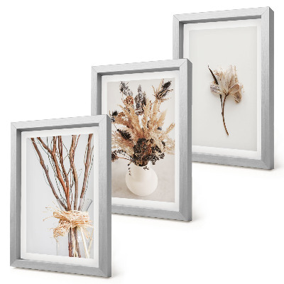 Tríptico com moldura Flores e galhos em um estilo minimalista natural.