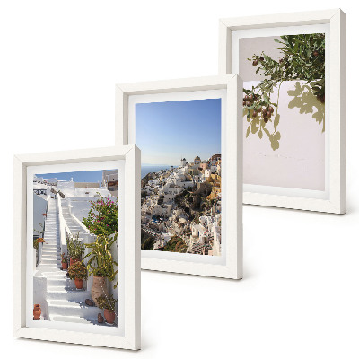 Conjunto de molduras com imagens Escadaria branca em Santorini com vista para a cidade.