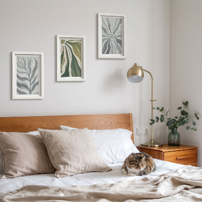 Conjunto de 3 quadros decorativos Padrões de plantas em tons de verde e cinza.