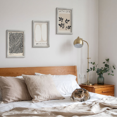 Conjunto de 3 quadros decorativos Estampas florais e linhas minimalistas em tons neutros.