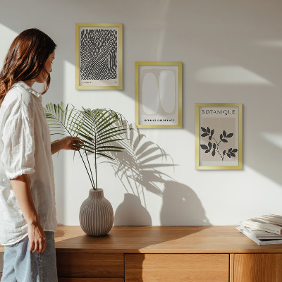 Conjunto de 3 quadros decorativos Estampas florais e linhas minimalistas em tons neutros.