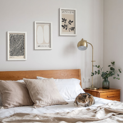 Conjunto de 3 quadros decorativos Estampas florais e linhas minimalistas em tons neutros.