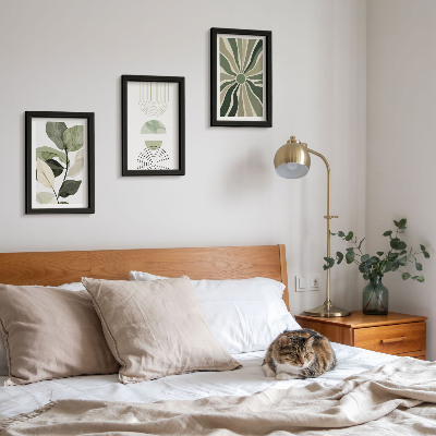 Conjunto de 3 quadros decorativos Motivos vegetais com formas geométricas em verde.