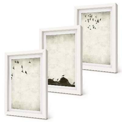 Conjunto de molduras com imagens bando de pássaros voando em estilo minimalista