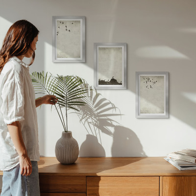 Conjunto de molduras com imagens bando de pássaros voando em estilo minimalista