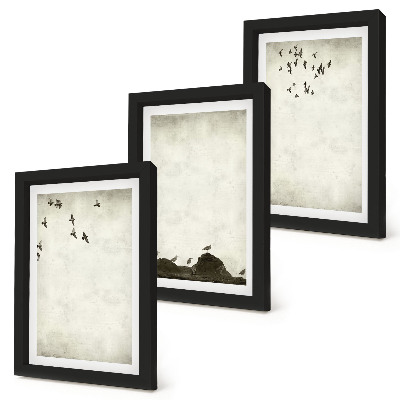 Conjunto de molduras com imagens bando de pássaros voando em estilo minimalista